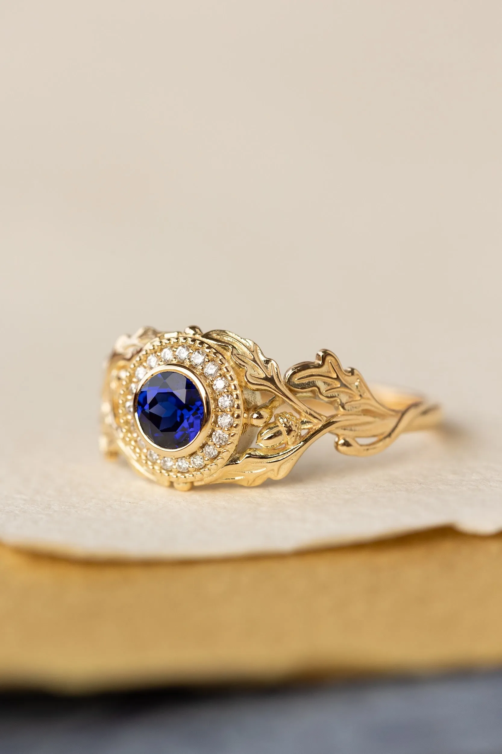 Halo diamond and lab blue sapphire engagement ring, celtic ring with oak leaves and diamonds / Dair