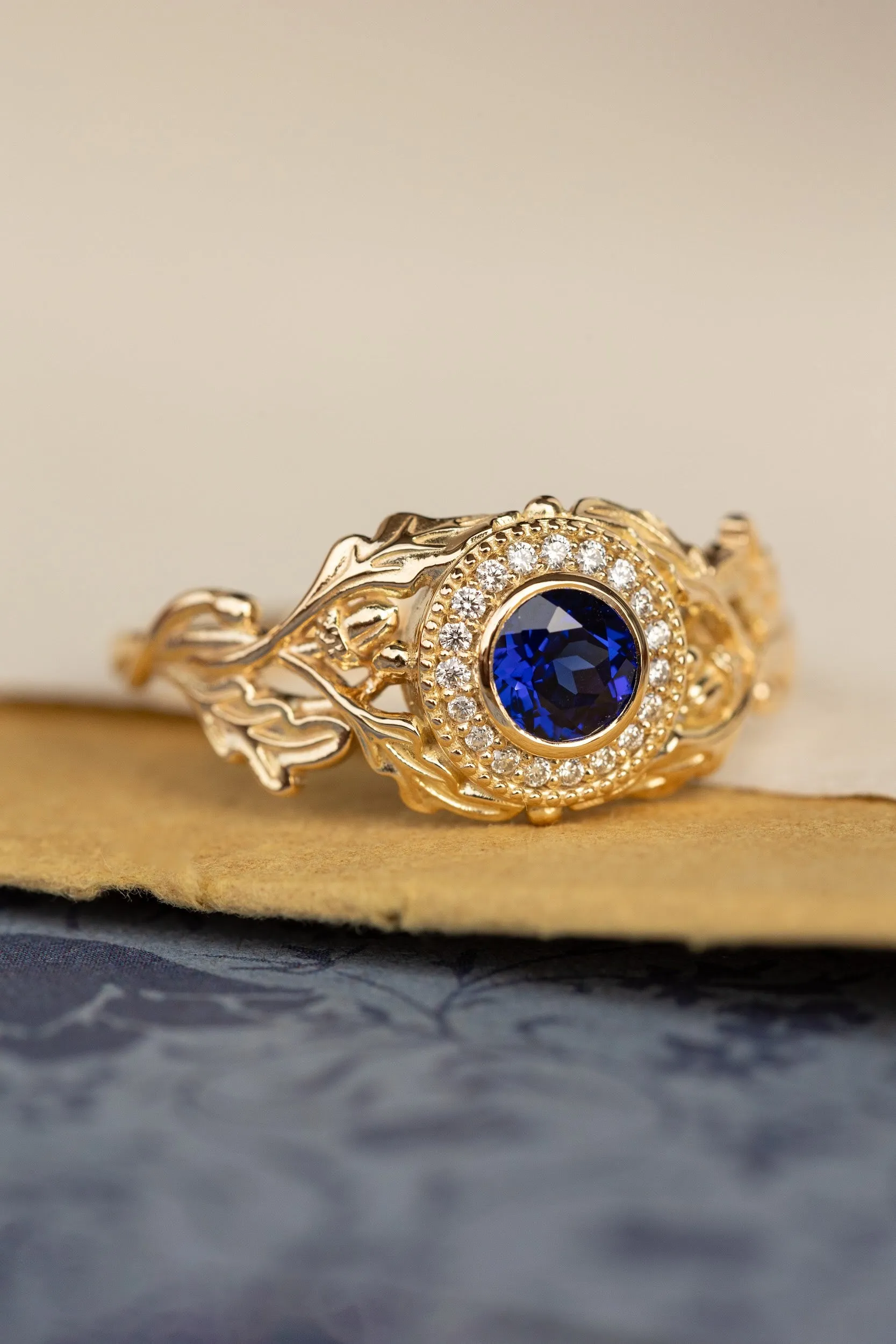 Halo diamond and lab blue sapphire engagement ring, celtic ring with oak leaves and diamonds / Dair